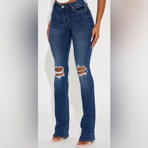 Mid Rise Distressed Bootcut Jean